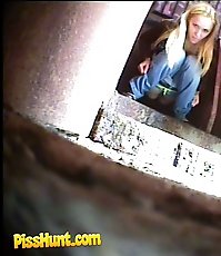 Blonde babe pissing in a spycammed park toilet