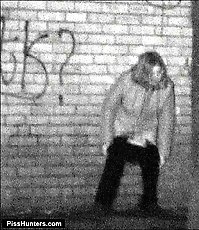 Girl takes a secret leak in the street at night