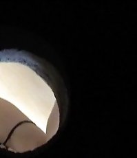 Young chick in sexy thongs pees in a cesspool