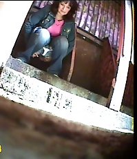 Pissing chick get busted and filmed in park loo