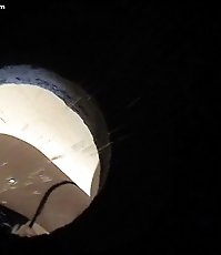 Young chick in sexy thongs pees in a cesspool