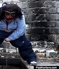 Brunette fatty takes a piss under spycam glance