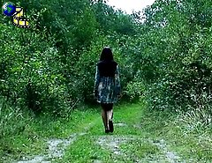 Juicy teenage shortie piddles in the forest