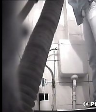 Young pissers tinkling in front of spy cam