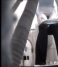 Voyeur peeps after two babes in public toilet