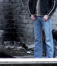 Girl peeing while a guy screens her from glances