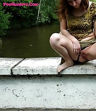 Three teen whores pissing off the old bridge