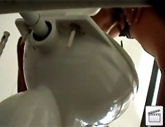 Watch sexy bikini girls squat over a spycammed pan