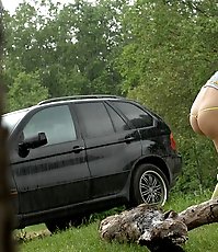 Posh hoochie takes a stop in the woods to piss