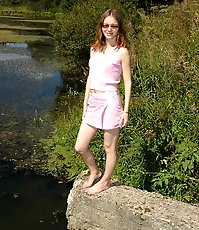 Young bitch shot pissing straight into the river