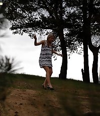Cute babe goes out commando and pisses in the woods