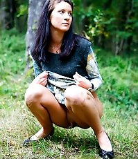 Nasty teen doing water sports in the forest glade