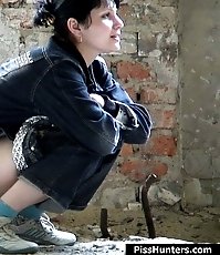 Awesome brunette emptying her overfilled bladder