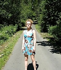 Teeny pissing in the middle of the country road