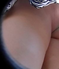 Tiny panty hardly covering fatty ass in this upskirt movie