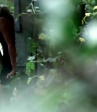 Thrilling outdoor voyeur pics of two piddling chicks