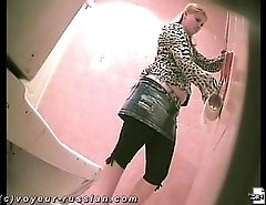 Real yummy blonde babe with stunning tail feathers takes a leak over a toilet pan equipped with spy cam