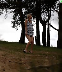 Cute babe goes out commando and pisses in the woods