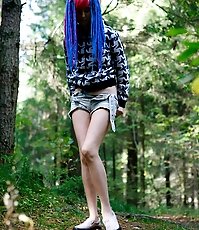 Young cutie empties her bladder in the forest