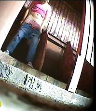 Two babes pissing in a spycammed park toilet