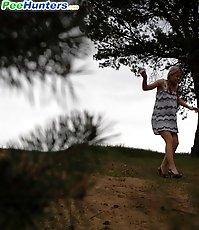 Cute babe goes out commando and pisses in the woods