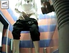 Sporty chick with hot ass takes a leak on spy cam