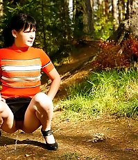 Dark-haired hiker ho filmed pissing in the forest