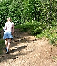 Sexy naked lass takes a quick leak on her way home