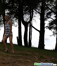 Shameless cute hoochie makes piddle alfresco