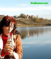 See a cute teen redhead pissing at the stadium