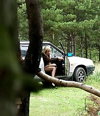 Beautiful blonde caught pissing at a camping site