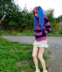Naughty teen with a pink and blue hair caught peeing