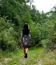 Spying after a brunette kitty pissing in the woods