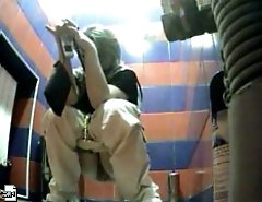 Really sexy babes pees in spycammed toilet