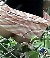 Cam hidden in woods films peeing girl in close-up