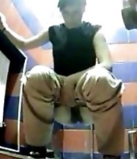 Two awesome big asses filmed by a spy cam in loo