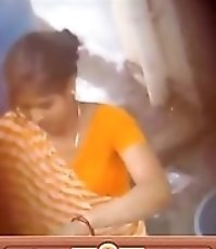 Housewife caught by doing household work