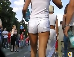 Pretty slim bimbo in the tight white pants proudly demonstrating the hot perfect body