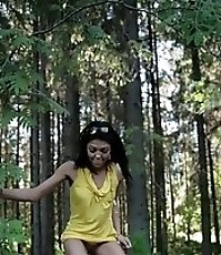 Watch a skinny exotic brunette piddle in the woods