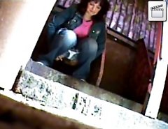 Hot mamas emptying their bladders in park toilet