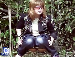 Spying on an unsuspecting chick piddling in the bushes
