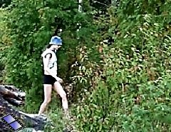 Exclusive spy video of a girl peeing in the bush