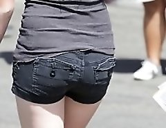 Blue and black shorts on sexy butts