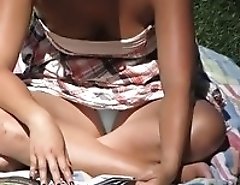 Blue panties on a sitting cutie. Hot up skirt