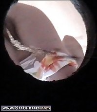 White panties uncover a young pussy full of pee