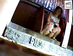 Voyeur camera films bitches pissing in park toilet