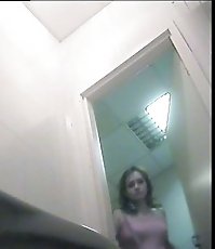 Naughty mama tinkling straight onto voyeur camera