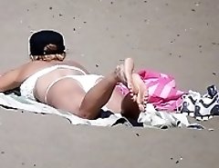 Girls in bikinis get on beach spy cam