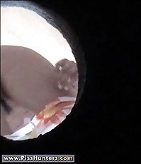 White panties uncover a young pussy full of pee