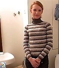 Amateur blondie gets filmed urinating in the loo